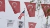 Turkish flags and banners depicting Mustafa Kemal Ataturk, the founder of modern Turkey, decorate a street outside the United States Embassy in Ankara, Turkey, Apr. 25, 2021. 