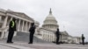 U.S. Capitol Police stand guard on a plaza surrounding the Capitol before Congress meets to certify the electoral college vote for President-elect Joe Biden in Washington, Jan. 6, 2021. 