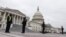 U.S. Capitol Police stand guard on a plaza surrounding the Capitol before Congress meets to certify the electoral college vote for President-elect Joe Biden in Washington, Jan. 6, 2021. 