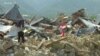 Flags Mark Sites of Trapped Bodies in Indonesia Quake