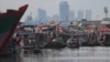 Desa nelayan di Teluk Jakarta di Jakarta, Selasa, 19 Oktober 2021. (AP Photo/Achmad Ibrahim)