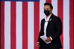 Performer Luis Fonsi arrives to speak at a Hispanic Heritage Month event featuring Democratic presidential candidate former Vice President Joe Biden, Tuesday, Sept. 15, 2020, at Osceola Heritage Park in Kissimmee, Fla.