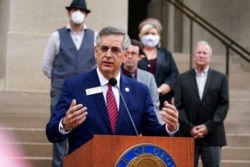 Georgia Secretary of State Brad Raffensperger speaks during a news conference in Atlanta, Nov. 11, 2020.