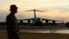 An Australian Air Force C-17 taxis at the RAAF Base Pearce near Perth, March 28, 2014. The C-17 delivered an Australian Navy SeaHawk helicopter which will be used in the search for Malaysian Airlines flight MH370 in the southern Indian Ocean. 