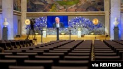 U.N. Secretary General Antonio Guterres speaks in the University Hall during the digital broadcast of the Nobel Peace Prize Forum, in Oslo, Norway, Dec.11, 2020.