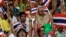 Thai protesters chant slogans during an anti-governemnt demonstration at a turf club in Bangkok, Thailand, October 28, 2012.