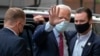 Democratic presidential candidate former Vice President Joe Biden waves as he arrives at The Queen theatre in Wilmington, Del., Oct. 19, 2020.