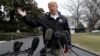 President Donald Trump talks with reporters outside the White House before traveling to Alabama to visit areas affected by the deadly tornadoes, March 8, 2019, in Washington.