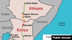 An Indian laborer sleeps surrounded by mounds of mangoes at a fruit market in Hyderabad.