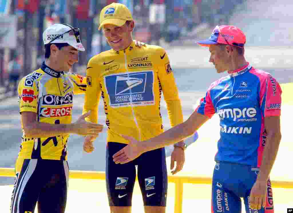  July 28, 2002: Armstrong wins his fourth consecutive Tour de France.
