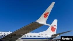 资料照：中国国航的波音737 MAX飞机停在北京的一个机场（路透社2019年3月11日）