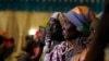 Parents of the Chibok girls attend a meeting with Nigeria's President Muhammadu Buhari at the presidential villa in Abuja, Nigeria, Jan. 14, 2016.