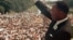 Martin Luther King Jr. acknowledges the crowd at the Lincoln Memorial for his "I Have a Dream" speech during the March on Washington, August 28, 1963. 