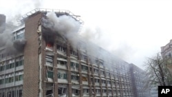 Mali's Berthe Osman (R) challenges Pantsil John (L)of Ghana during their African Cup of Nations Group D soccer match in FranceVille Stadium January 28, 2012.