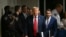(FILES) Former US President Donald Trump, with his lawyer Todd Blanche, walks to speak to the press at the end of the day of his trial for allegedly covering up hush money payments linked to extramarital affairs at Manhattan Criminal Court in New York Ci