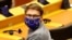 European Parliament member Moritz Korner, wearing a face mask with the EU flag, attends a plenary session on a new proposal for the EU's joint 2021-27 budget and an accompanying economic stimulus measure, in Brussels, May 27, 2020.