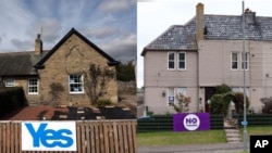 苏格兰埃克尔斯一个支持独立的标语牌（左）以及苏格兰伯恩茅斯一个反对独立的标语牌（右）。（2014年9月8日）