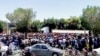 In this image shared on social media, hundreds of Iranians march in the central city of Isfahan’s New Shapur district, July 31, 2018, to denounce the government’s handling of the rial’s recent slump to record lows against the dollar.