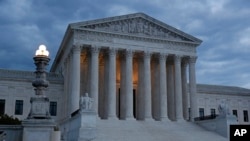 Clouds roll over the U.S. Supreme Court building at dusk on Capitol Hill in Washington, D.C., May 3, 2020.