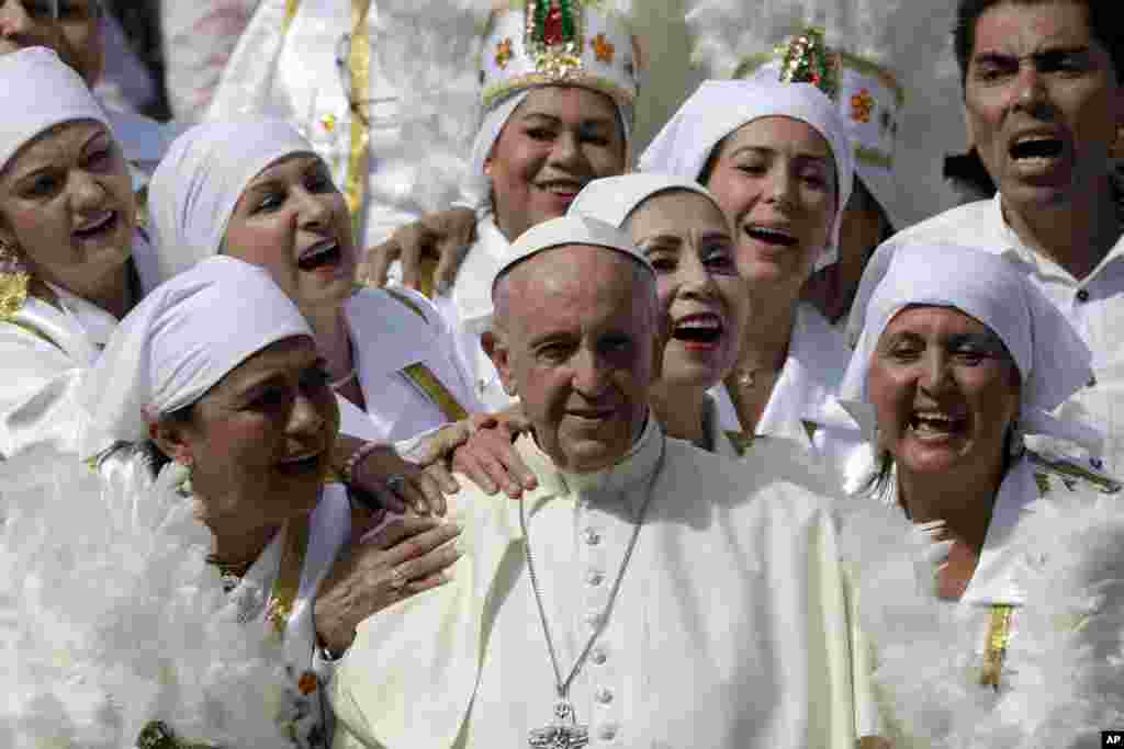 Pope Francis meets a group of faithful from Mexico during his weekly general audience, at the Vatican.