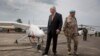 Under-Secretary-General Hervé Ladsous is given briefing on drones during official launch in Goma, Dec. 3, 2013. 