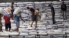 Suasana di gudang beras BULOG di Jakarta. (Foto: AP/Achmad Ibrahim)