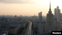 Boys play with a drainage culvert used for flood control in Las Pinas, Metro Manila, the Philippines.