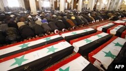 Dəməşqdə dəfn mərasimi Əsədə dəstək nümayişinə çevrilib (YENİLƏNİB)