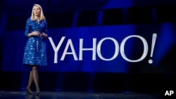 FILE - Yahoo president and CEO Marissa Mayer speaks during the International Consumer Electronics Show in Las Vegas. 