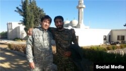 مصطفی صدرزاده در کنار ابوحامد، فرمانده لشکر فاطمیون که هر دو در سوریه کشته شده‌اند
