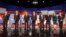 Republican presidential candidates John Kasich, Jeb Bush, Marco Rubio, Donald Trump, Ben Carson, Ted Cruz, Carly Fiorina and Rand Paul take the stage before the Republican presidential debate at the Milwaukee Theatre, Nov. 10, 2015, in Milwaukee. 