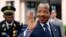FILE - Cameroon's president, Paul Biya, waves as he arrives at an EU-Africa summit on April 3, 2014, at EU Headquarters in Brussels. In a rare public appearance, Biya on Friday paid homage to four top military officers killed in a helicopter crash last month and urged fellow citizens to unite in the fight against Boko Haram.
