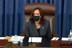 FILE - In this image from Senate TV, Vice President Kamala Harris sits in the chair on the Senate floor to cast her first tie-breaking vote at the Capitol in Washington, Feb. 5, 2021.