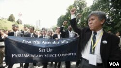 Para pengacara Malaysia berpartisipasi dalam aksi unjuk rasa di Kuala Lumpur (29/11).