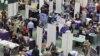 Job seekers at US job fair (file photo)