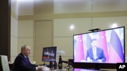 گفتگوی ولادیمیر پوتین و شی جین ‌پینگ، روسای جمهوری روسیه و چین.