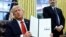 Tổng thống Mỹ Donald Trump ký sắc lệnh hành pháp tại Nhà Trắng ở Washington, 10/2 (REUTERS/Kevin Lamarque).