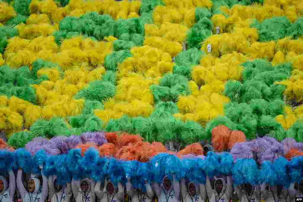 សិស្សសាលា​ម៉ាឡេស៊ី​ធ្វើការ​សម្តែង​នៅ​អំឡុងពិធី​បុណ្យ​ឯករាជ្យ​ជាតិ​លើក​ទី​ ៥៩ ក្នុង​ក្រុង​កូឡាឡាំពួរ។&nbsp;