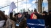 FILE - People shout slogans as they march across the Brooklyn Bridge in solidarity with the Jewish community after recent string of anti-Semitic attacks throughout the greater New York area, Jan. 5, 2020, in New York. 