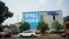 FILE - A banner stating "Still here" hangs on the side of the Planned Parenthood building in St. Louis, Missouri, May 31, 2019. 