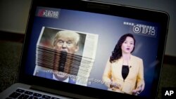 通过网络播放的中国国际电视台的一段有关美中贸易紧张关系的视频（2018年8月23日） 