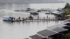 Tourists and gamblers disembark a boat on the Mekong River near the Thai port of Chiang Saen in the Golden Triangle region where the borders of Thailand, Laos, and Burma meet January 14, 2012. 