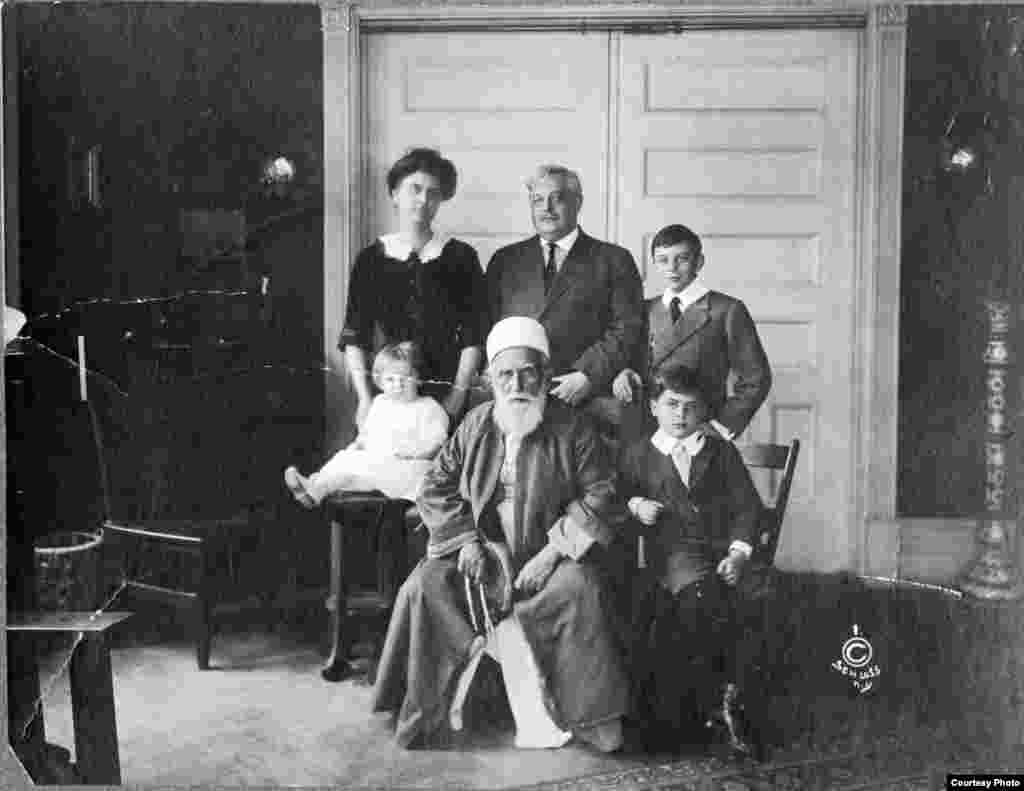 Abdu'l Baha with the Kinney family in their home, April 1912.