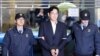 FILE PHOTO - Samsung Group chief, Jay Y. Lee arrives at the office of the independent counsel team in Seoul, South Korea, February 22, 2017.