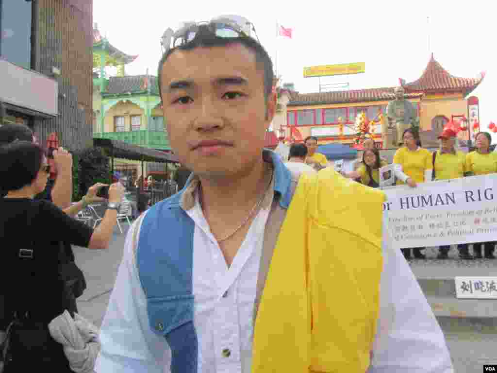 中国人权保护组织秘书长范怙昶(美国之音容易拍摄) 