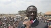 Uganda's opposition leader Kizza Besigye speaks during a rally at Rubaga division in the capital Kampala, Uganda, February 14, 2011