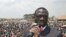 Uganda's opposition leader Kizza Besigye speaks during a rally at Rubaga division in the capital Kampala, Uganda, February 14, 2011