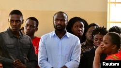 Ugandan independent filmmaker Moses Bwayo stands in the dock at the Makindye Magistrate Court, in Kampala, Uganda, March 4, 2020.