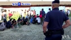 VOA60 AFIRKA: A Birnin Paris Na Kasar Faransa Ne 'Yan Sanda Suka Kauda Yan Gudun Hijira Su 2500