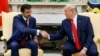 President Donald Trump shakes hands with Qatar's Emir Sheikh Tamim Bin Hamad Al-Thani in the Oval Office of the White House, Tuesday, July 9, 2019, in Washington. (AP Photo/Evan Vucci)